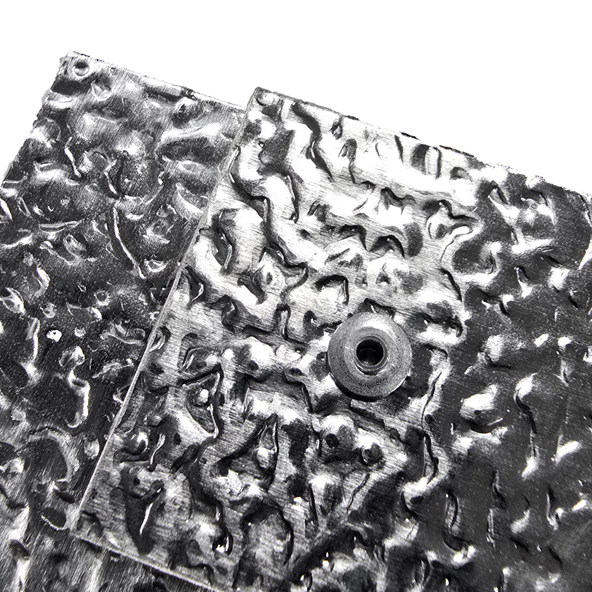 Close-up of the aluminium cladding attached by the rivet