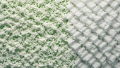 Textured surface contrasting snow-covered grass and patterned pavement illustrating foam board insulation.