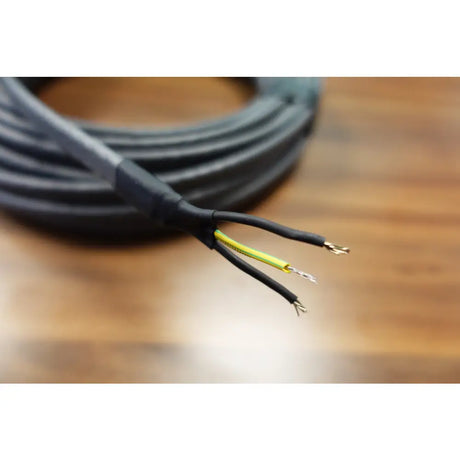 Black electrical cable with exposed wires for sprinkler systems and insulation.