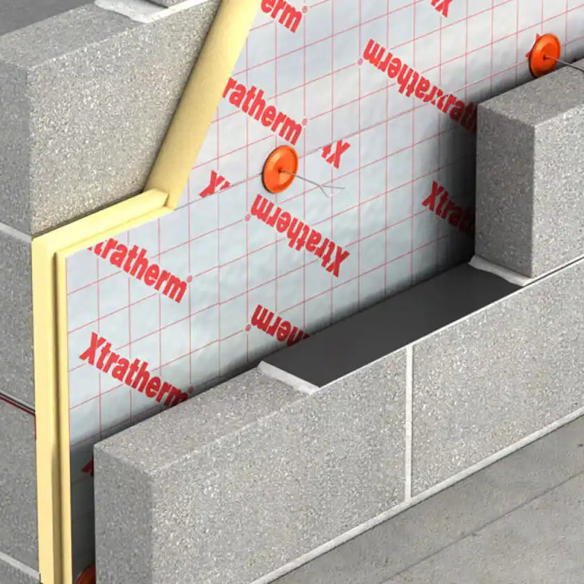 An xtratherm insulation board between two wall sections