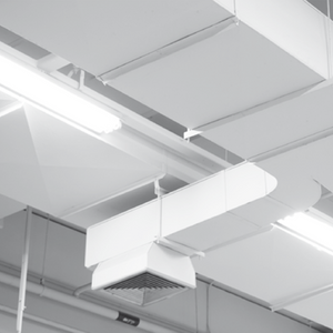 White ceiling-mounted ventilation and lighting fixtures installed on a gray industrial ceiling.