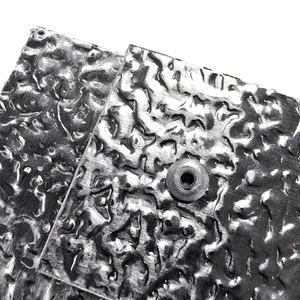 Close-up of the aluminium cladding attached by the rivet